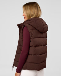 Woman wearing Go-To Puffer Vest - Hot Chocolate | Model:Issy | Size:XS