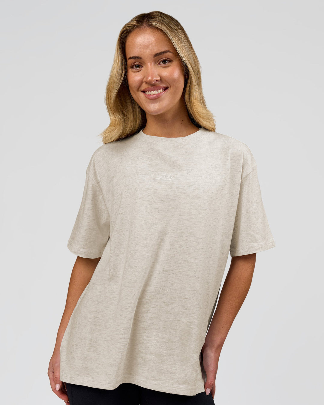 Woman wearing Go-To Script FLXCotton Oversized Tee - Silver Marl-White | Model:Issy | Size:XS - view 1