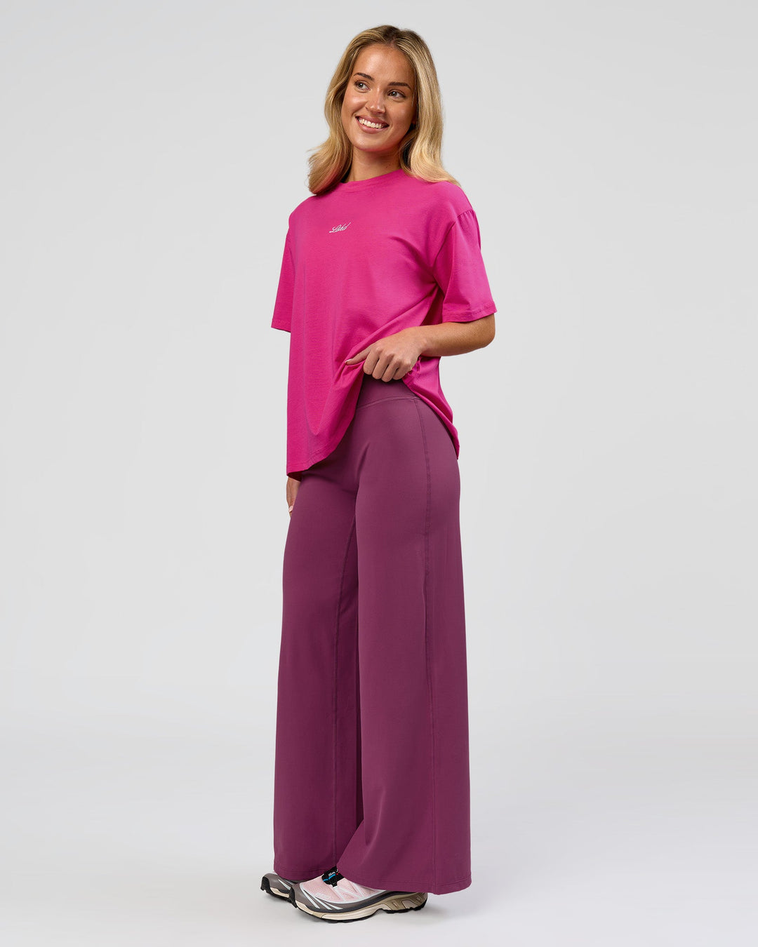 Woman wearing Go-To Script FLXCotton Oversized Tee - Ultra Pink-White | Model:Issy | Size:XS - view 4