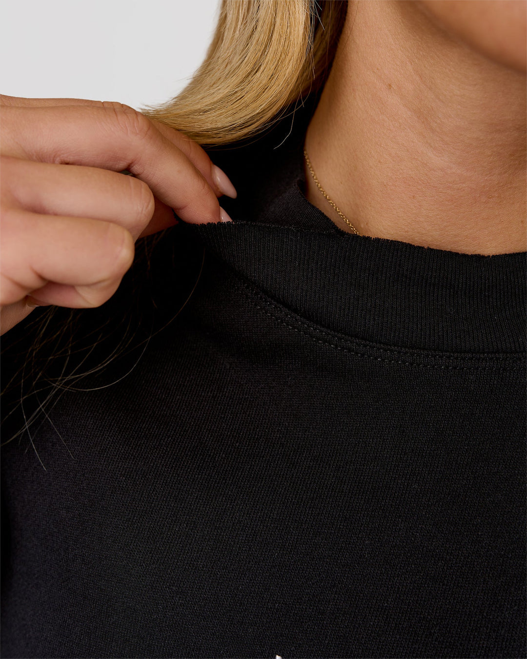 Woman wearing Go-To Terry Oversized Pull Over - Black-White | Model:Issy | Size:XS - view 5