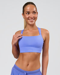 Woman wearing High Velocity Sports Bra - Bluebell | Model:Issy | Size:XS | Thumbnail Index: 0