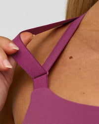 Woman wearing High Velocity Sports Bra - Boysenberry | Model:Issy | Size:XS | Thumbnail Index: 5
