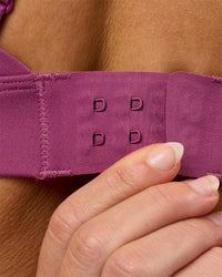 Woman wearing High Velocity Sports Bra - Boysenberry | Model:Issy | Size:XS | Thumbnail Index: 6