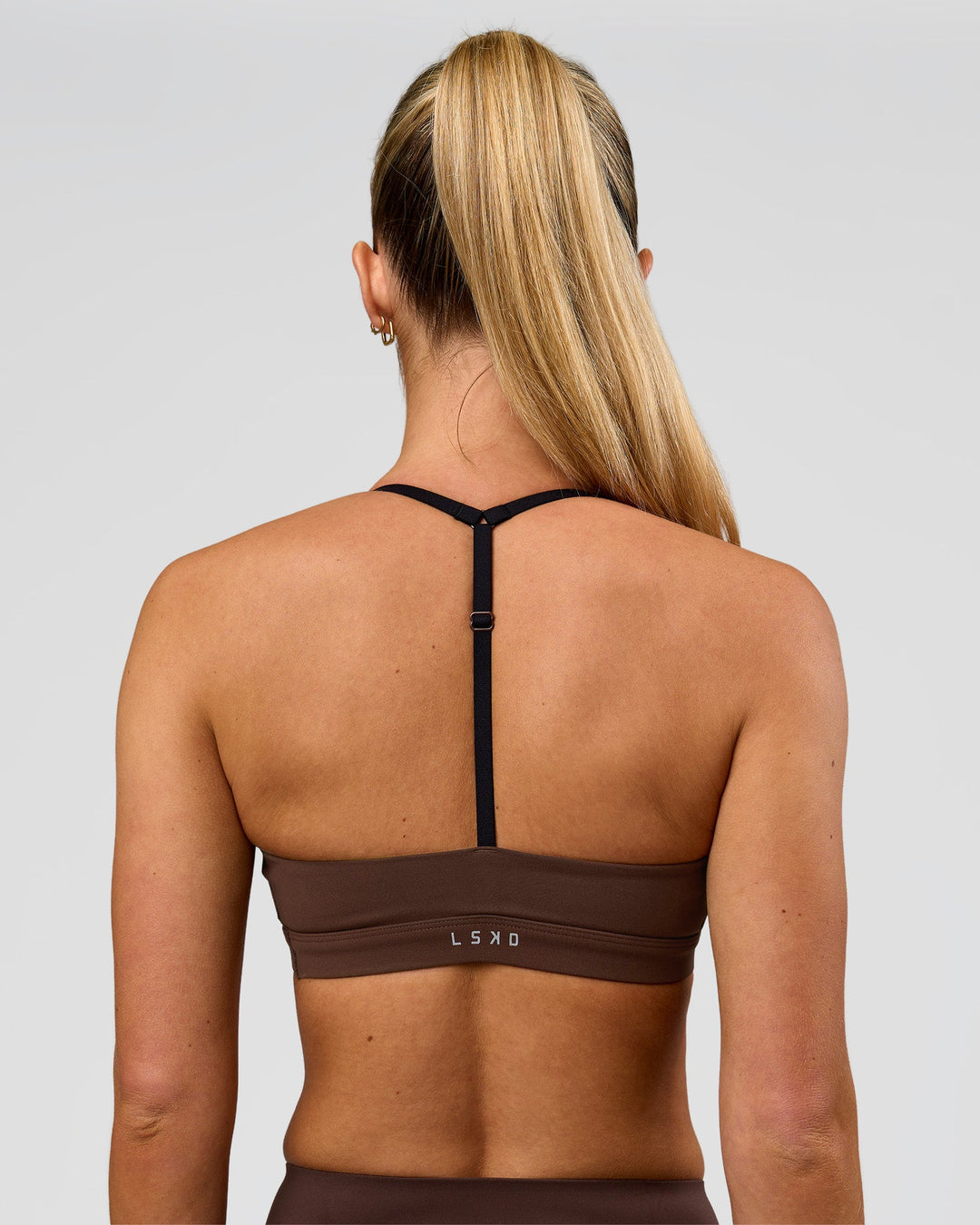 Woman wearing Infinity Sports Bra - Hot Chocolate | Model:Issy | Size:XS - view 6