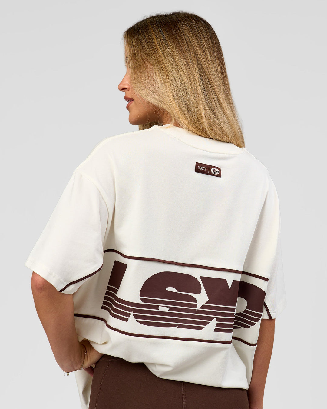 Woman wearing Inline Heavyweight FLXCotton Oversized Tee - Off White-Hot Chocolate | Model:Issy | Size:XS - view 10