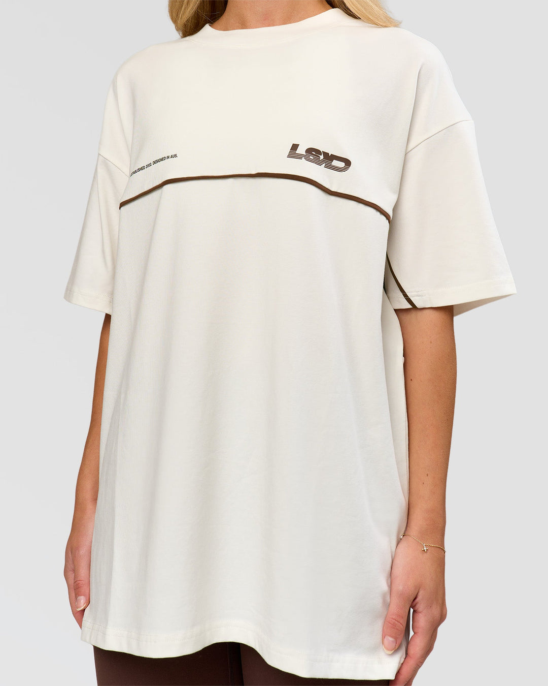 Woman wearing Inline Heavyweight FLXCotton Oversized Tee - Off White-Hot Chocolate | Model:Issy | Size:XS - view 11