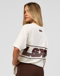 Woman wearing Inline Heavyweight FLXCotton Oversized Tee - Off White-Hot Chocolate | Model:Issy | Size:XS | Thumbnail Index: 14