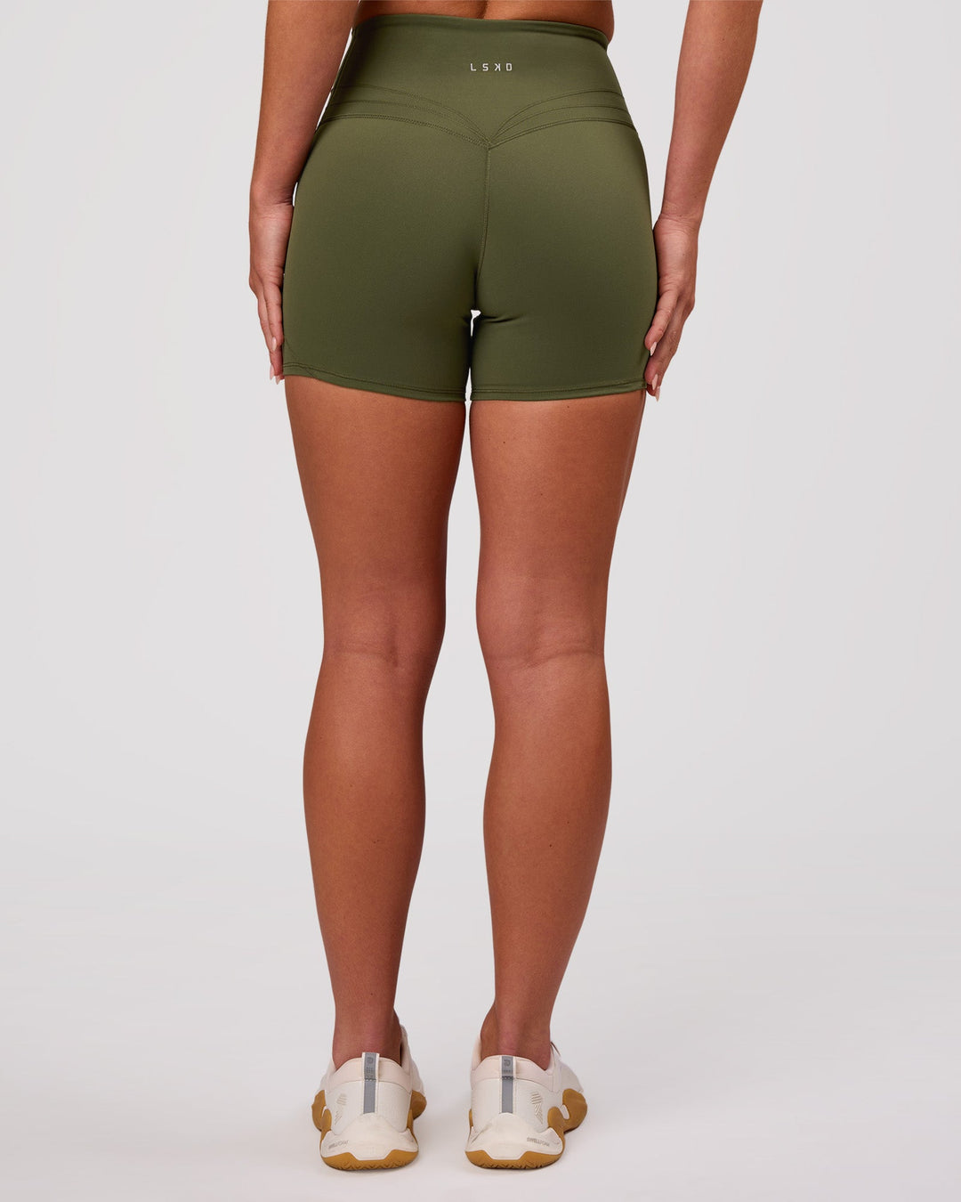 Woman wearing Luxe V-Contour High-Rise 4" Short - Pure Olive | Model:Issy | Size:XS - view 4
