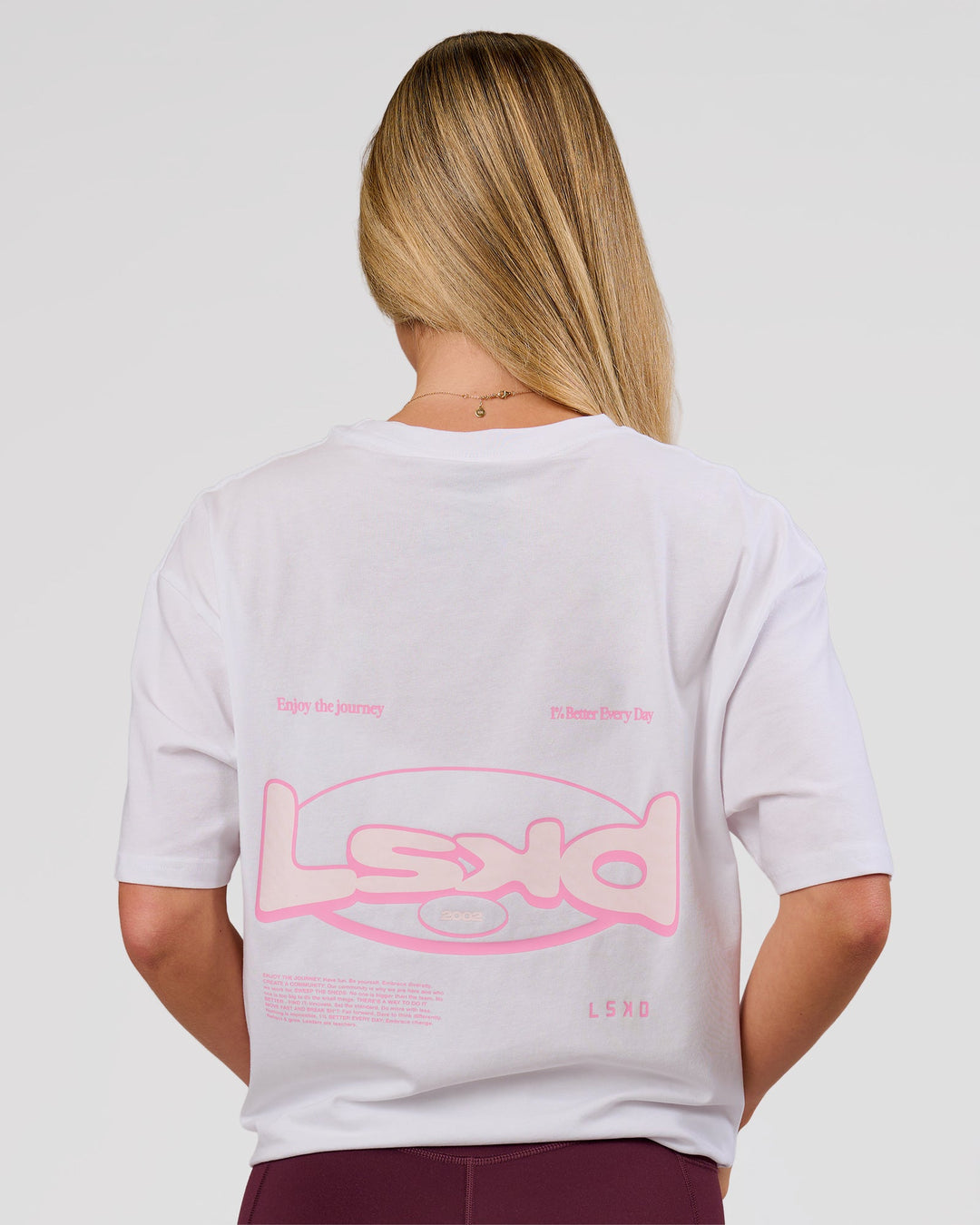 Woman wearing Magma FLXCotton Oversize Tee  - White-Pink Rose | Model:Issy | Size:XS - view 3