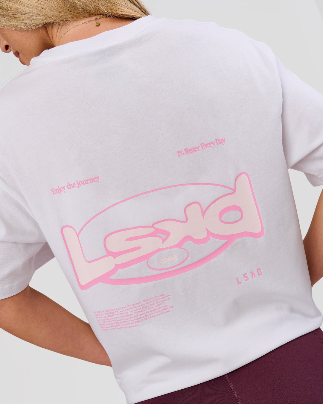 Woman wearing Magma FLXCotton Oversize Tee  - White-Pink Rose | Model:Issy | Size:XS - view 11