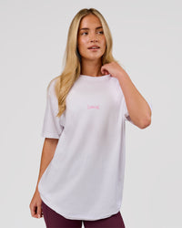 Woman wearing Magma FLXCotton Oversize Tee  - White-Pink Rose | Model:Issy | Size:XS | Thumbnail Index: 12