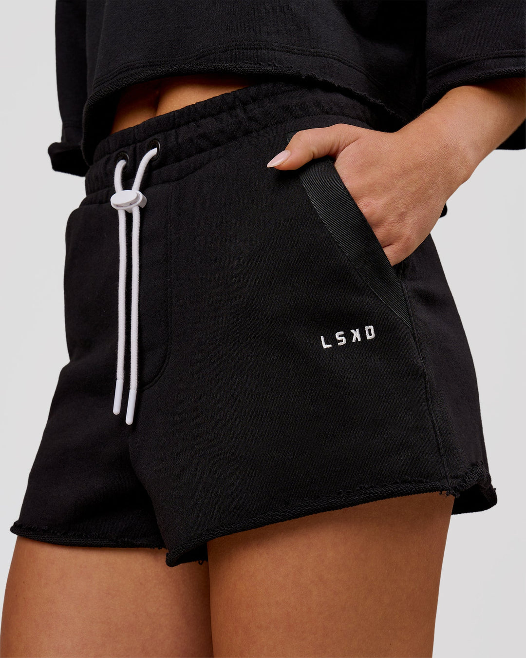 Woman wearing MVP Elite Terry Short - Black-White | Model:Issy | Size:XS - view 1