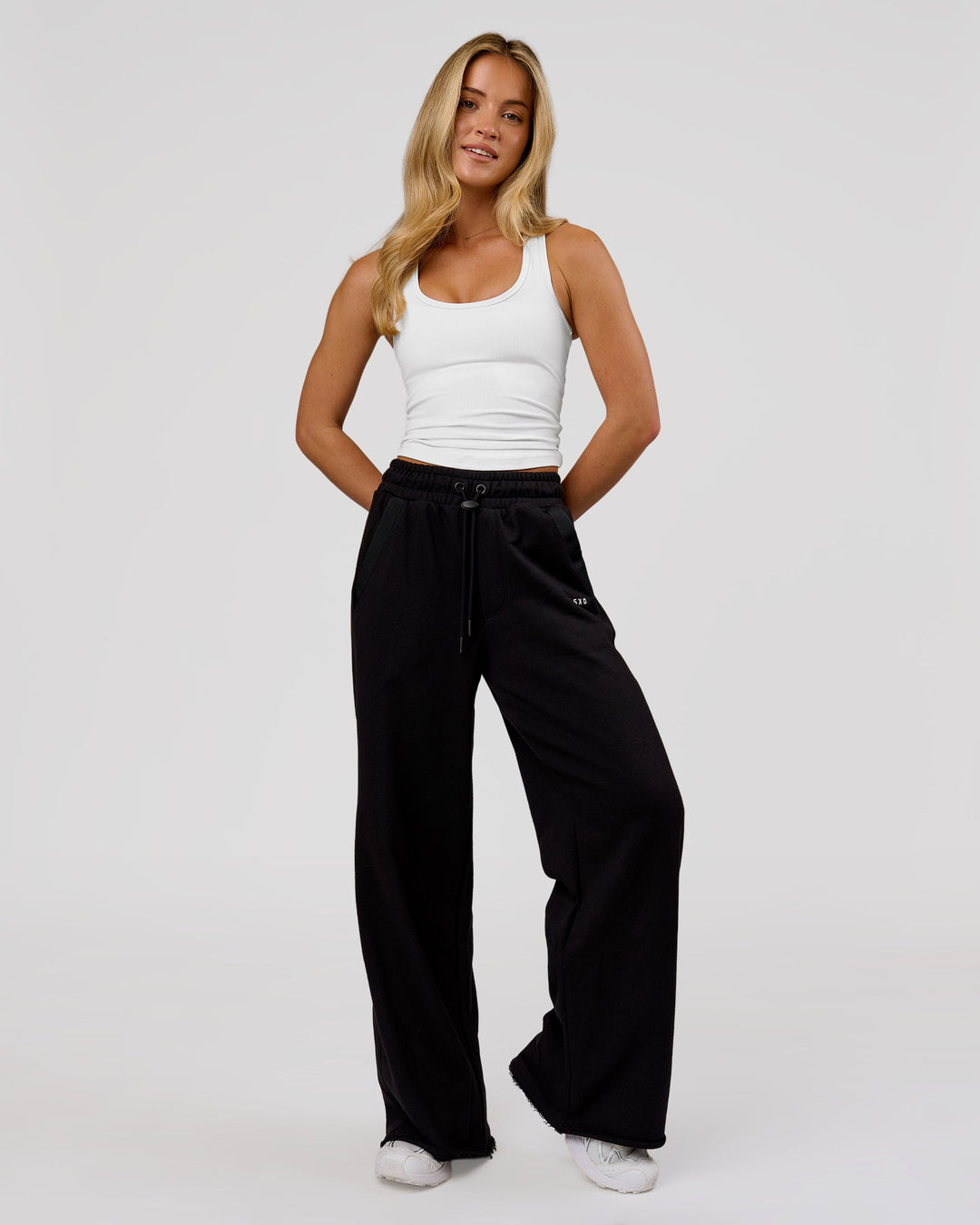 Woman wearing MVP Elite Terry Wide Leg Pant - Black-White | Model:Issy | Size:XS - view 4