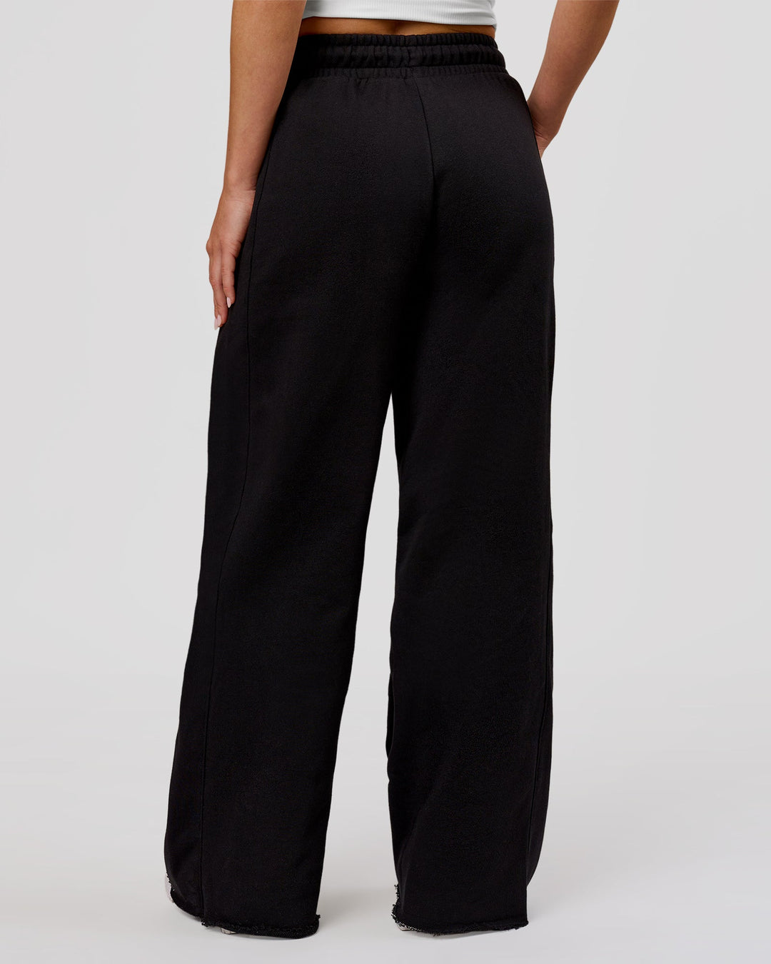 Woman wearing MVP Elite Terry Wide Leg Pant - Black-White | Model:Issy | Size:XS - view 5