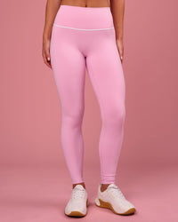 Woman wearing Pinnacle High-Rise Full Length Legging - Pink Rose-White | Model:Issy | Size:XS | Thumbnail Index: 2
