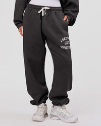 Woman wearing Playbook Baggy Cuffed Track Pant - Onyx-Off White | Model:Issy | Size:XS | Thumbnail Index: 7