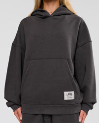 Woman wearing Playbook Boxy Hoodie - Onyx-Off White | Model:Issy | Size:XS | Thumbnail Index: 7