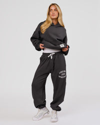 Woman wearing Playbook Boxy Hoodie - Onyx-Off White | Model:Issy | Size:XS | Thumbnail Index: 13