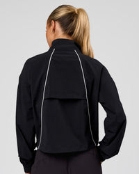 Woman wearing Pop Over Jacket - Black | Model:Issy | Size:XS | Thumbnail Index: 4