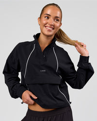 Woman wearing Pop Over Jacket - Black | Model:Issy | Size:XS | Thumbnail Index: 5