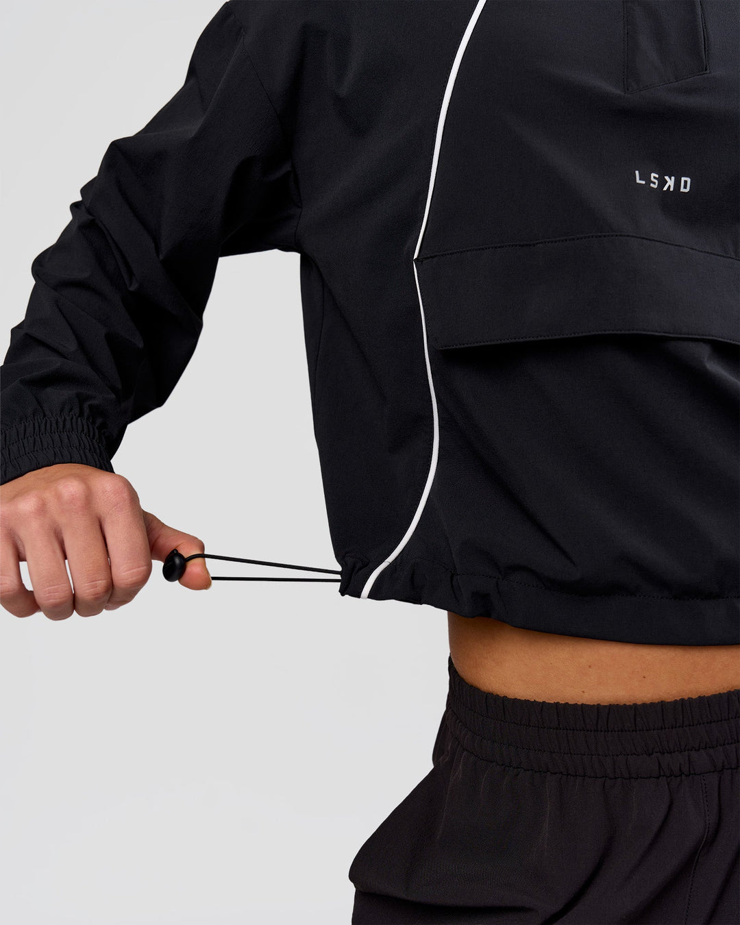 Woman wearing Pop Over Jacket - Black | Model:Issy | Size:XS - view 7