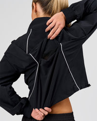 Woman wearing Pop Over Jacket - Black | Model:Issy | Size:XS | Thumbnail Index: 8