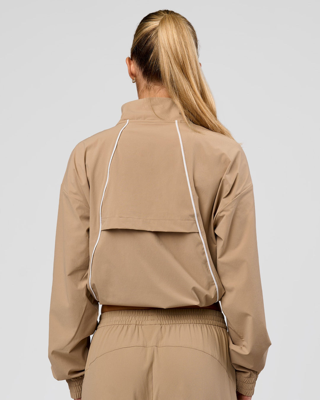 Woman wearing Pop Over Jacket - Warm Smoke | Model:Issy | Size:XS - view 5