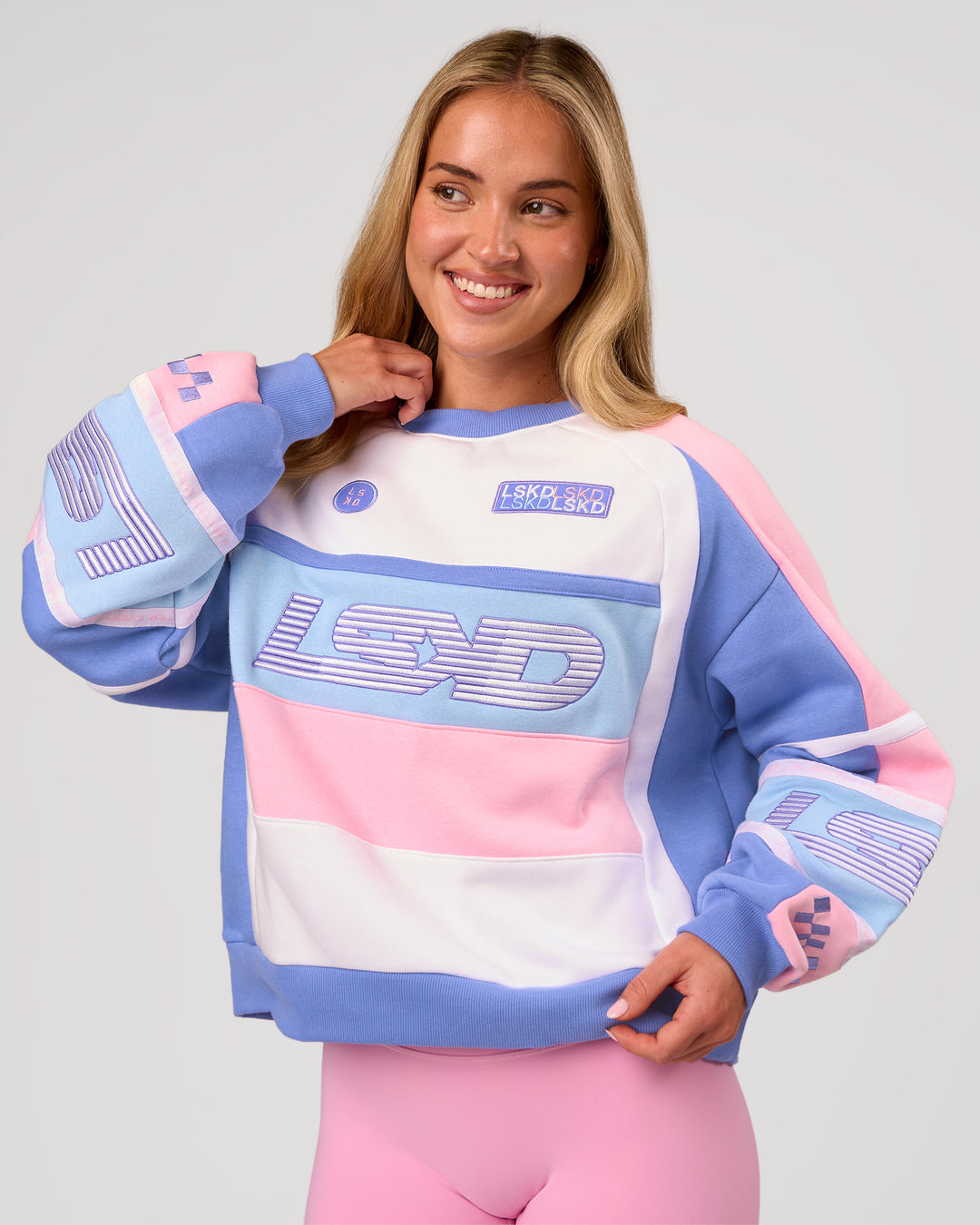 Woman wearing Power Sweater - Pink Rose-Bluebell | Model:Issy | Size:XS - view 1