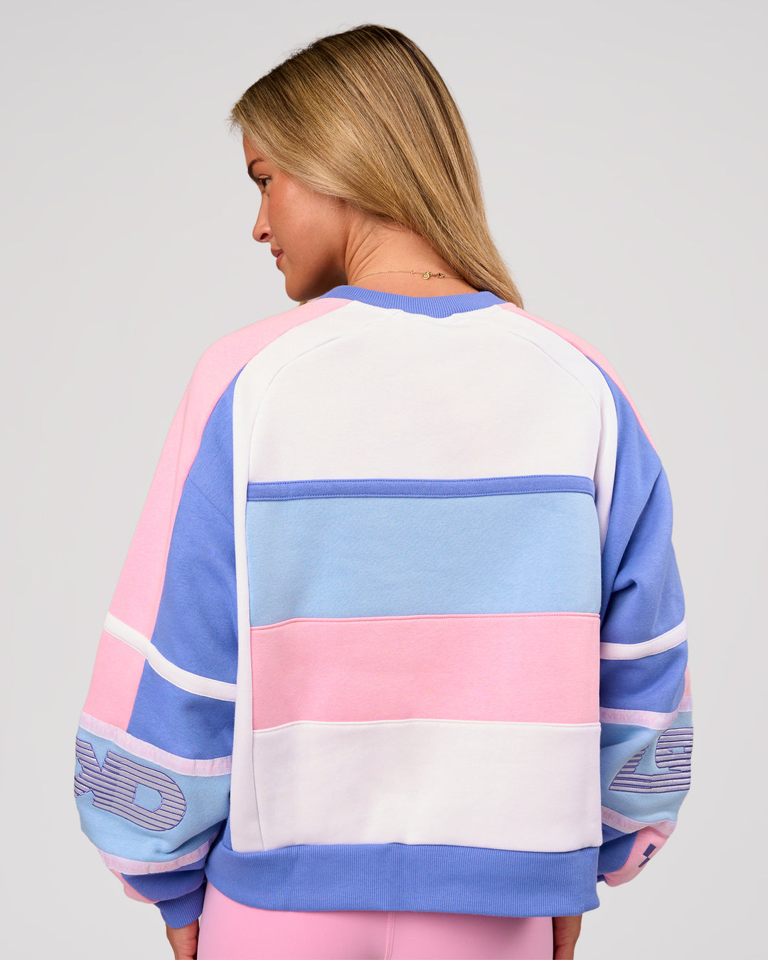 Woman wearing Power Sweater - Pink Rose-Bluebell | Model:Issy | Size:XS - view 3