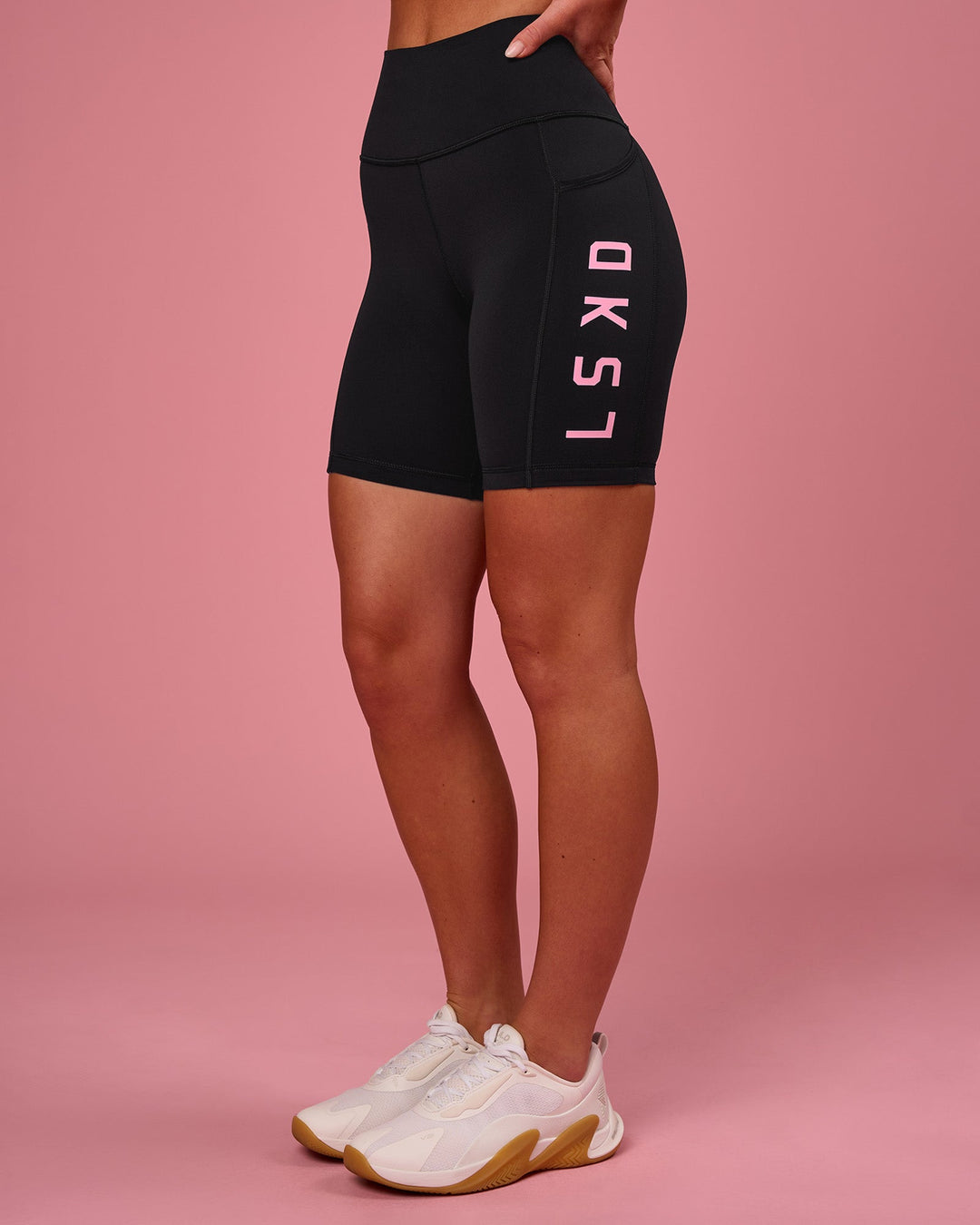 Woman wearing Rep Ultra High-Rise 6" Short Pockets - Black-Pink Rose | Model:Issy | Size:XS - view 8
