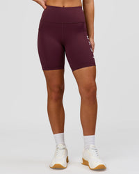 Woman wearing Rep Ultra High-Rise 6" Short Pockets - Cherry Lacquer-White | Model:Issy | Size:XS | Thumbnail Index: 2