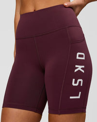 Woman wearing Rep Ultra High-Rise 6" Short Pockets - Cherry Lacquer-White | Model:Issy | Size:XS | Thumbnail Index: 1