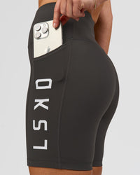 Woman wearing Rep Ultra High-Rise 6" Short Pockets - Onyx-white | Model:Issy | Size:XS | Thumbnail Index: 0