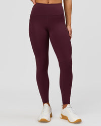 Woman wearing Rep Ultra High-Rise 7/8 Legging Pockets - Cherry Lacquer-White | Model:Issy | Size:XS | Thumbnail Index: 2