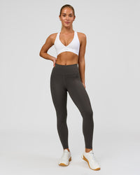 Woman wearing Rep Ultra High-Rise 7/8 Legging Pockets - Onyx-white | Model:Issy | Size:XS | Thumbnail Index: 7