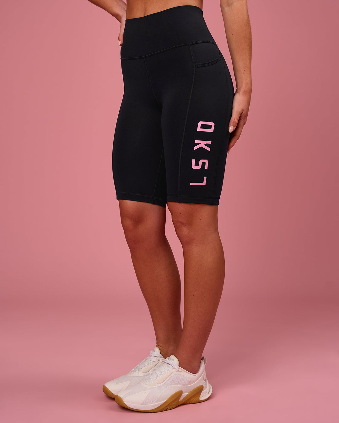 Woman wearing Rep Ultra High-Rise 9" Short Pockets - Black-Pink Rose | Model:Issy | Size:XS - view 6
