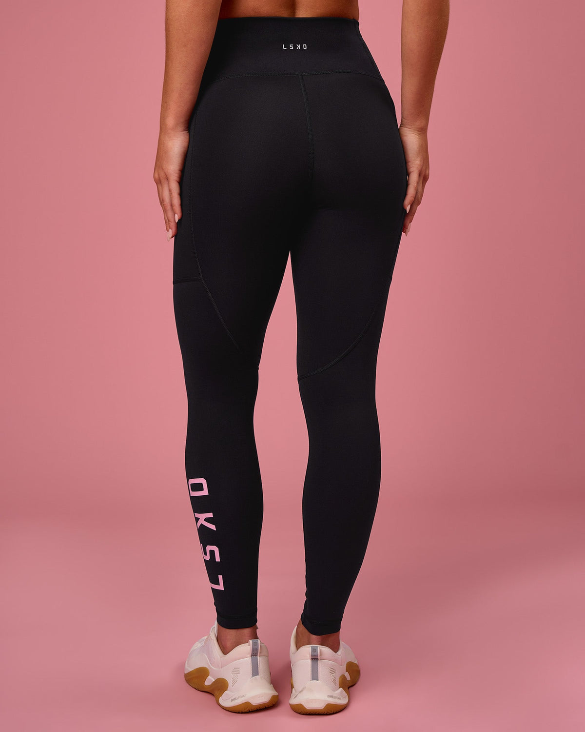 Woman wearing Rep Ultra High-Rise Full Length Legging Pockets - Black-Pink Rose | Model:Issy | Size:XS