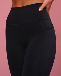 Woman wearing Rep Ultra High-Rise Full Length Legging Pockets - Black-Pink Rose | Model:Issy | Size:XS | Thumbnail Index: 7