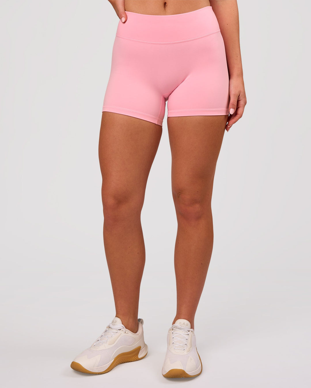 Woman wearing RXD Mid-Rise 4" Short - Pink Rose | Model:Issy | Size:XS - view 7