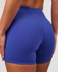 Woman wearing RXD Mid-Rise 4" Short - Power Cobalt | Model:Issy | Size:XS | Thumbnail Index: 1