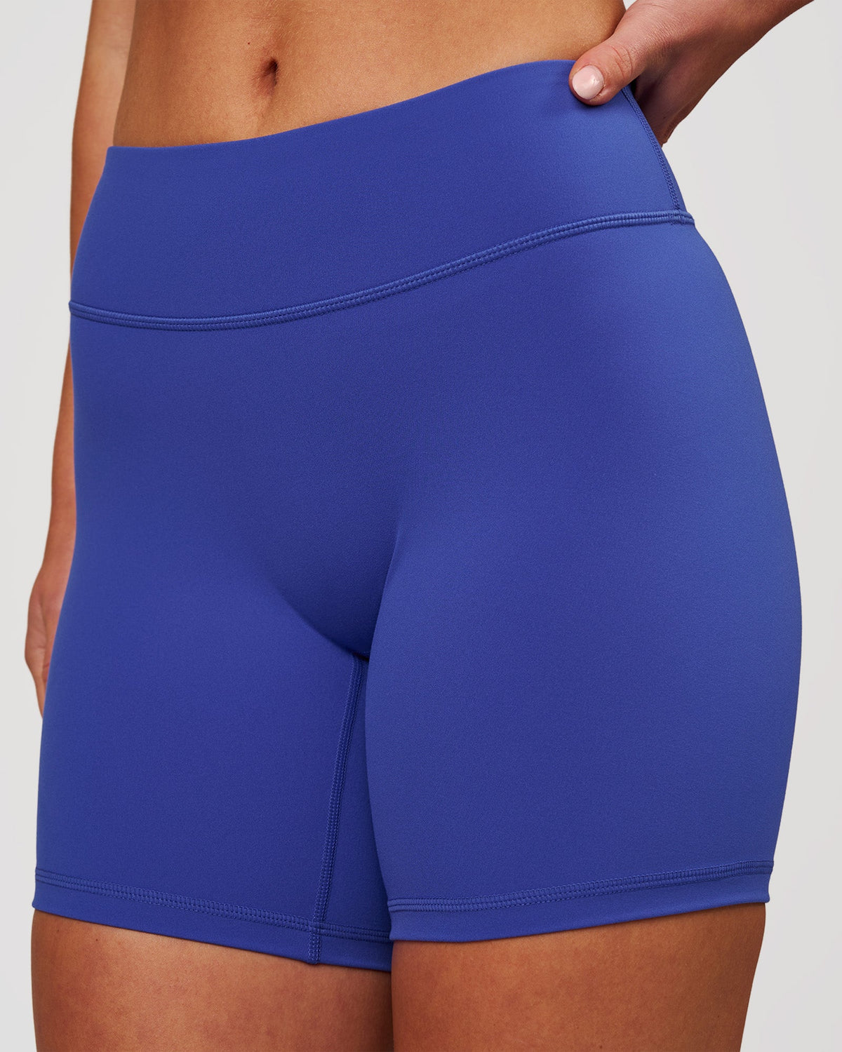 Woman wearing RXD Mid-Rise 6" Short - Power Cobalt | Model:Issy | Size:XS