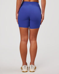 Woman wearing RXD Mid-Rise 6" Short - Power Cobalt | Model:Issy | Size:XS | Thumbnail Index: 2
