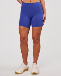 Woman wearing RXD Mid-Rise 6" Short - Power Cobalt | Model:Issy | Size:XS | Thumbnail Index: 4
