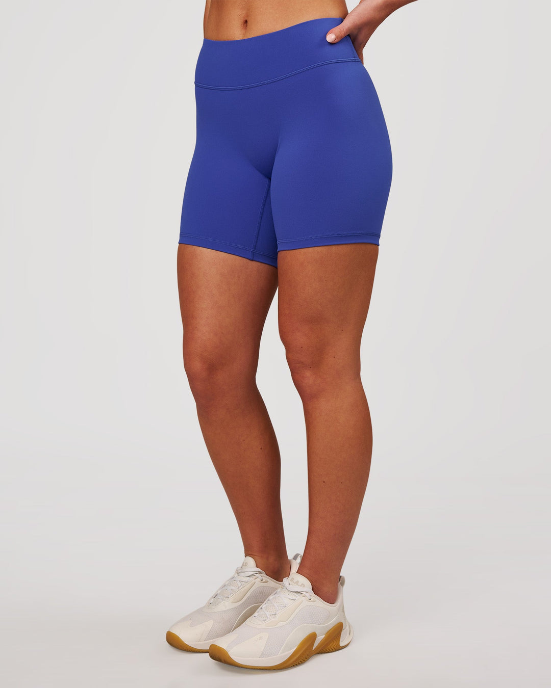 Woman wearing RXD Mid-Rise 6" Short - Power Cobalt | Model:Issy | Size:XS - view 7