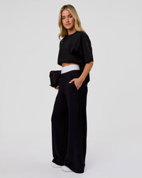 Woman wearing Shadow Mark Heavyweight Oversized Tee - Black-Onyx | Model:Issy | Size:XS | Thumbnail Index: 11