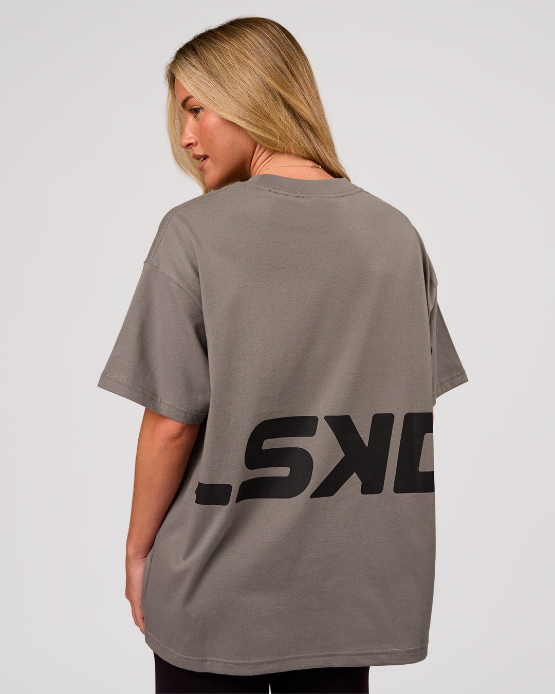Woman wearing Shadow Mark Heavyweight Oversized Tee - Storm Front-Onyx | Model:Issy | Size:XS - view 3