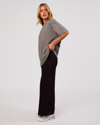 Woman wearing Shadow Mark Heavyweight Oversized Tee - Storm Front-Onyx | Model:Issy | Size:XS | Thumbnail Index: 11