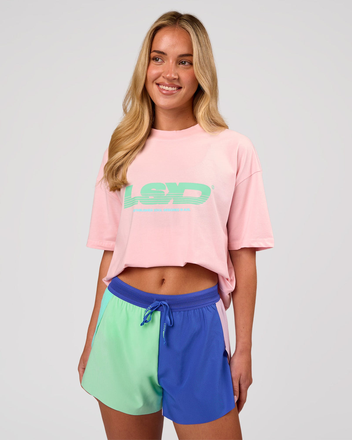 Woman wearing Sideline FLXCotton Oversized Tee - Marshmallow-Jelly Mint | Model:Issy | Size:XS - view 1