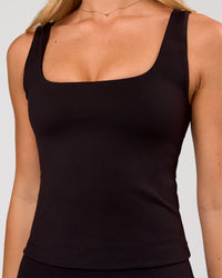 Woman wearing Staple 2.0 Active Shelf Bra Tank - Black | Model:Issy | Size:XS | Thumbnail Index: 2
