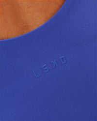Woman wearing Staple 2.0 Active Shelf Bra Tank - Power Cobalt | Model:Issy | Size:XS | Thumbnail Index: 4